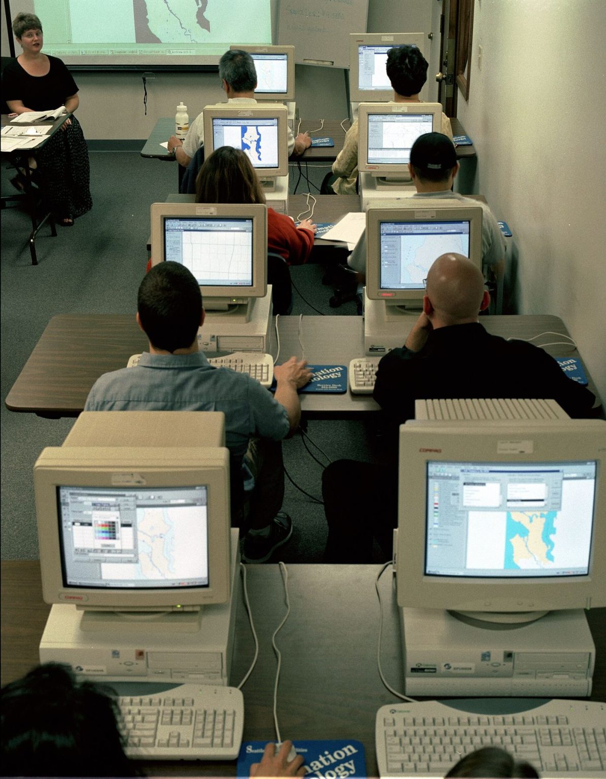 Adults’ Digital-Skills Classes Fill Up at Local Training Centres adults learning computer skills in a training classroom