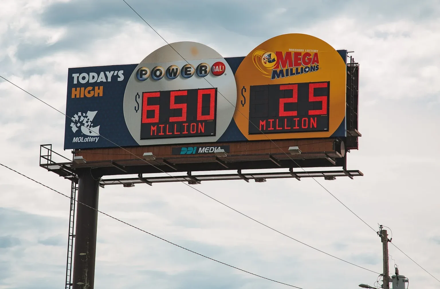 A roadside billboard advertising the Powerball and Mega Millions jackpots